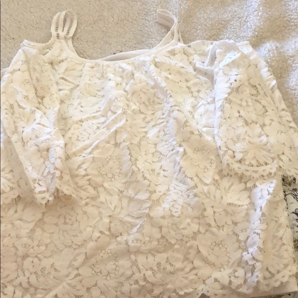 Cream colored off shoulder lace blouse